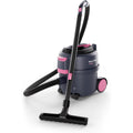 Aspirateur mixte associant l'entretien des surfaces de l'atelier au coloris rose