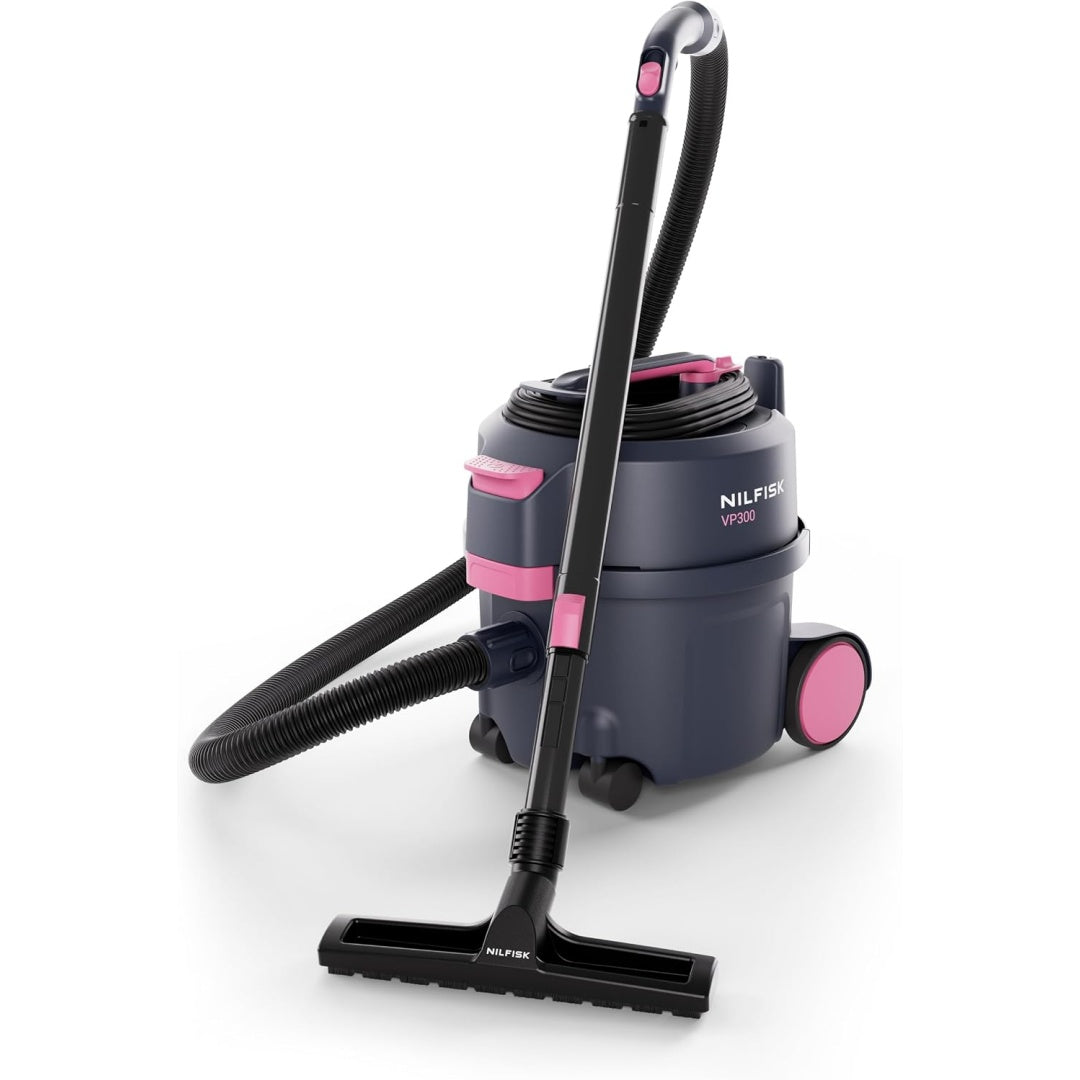Aspirateur mixte associant l'entretien des surfaces de l'atelier au coloris rose